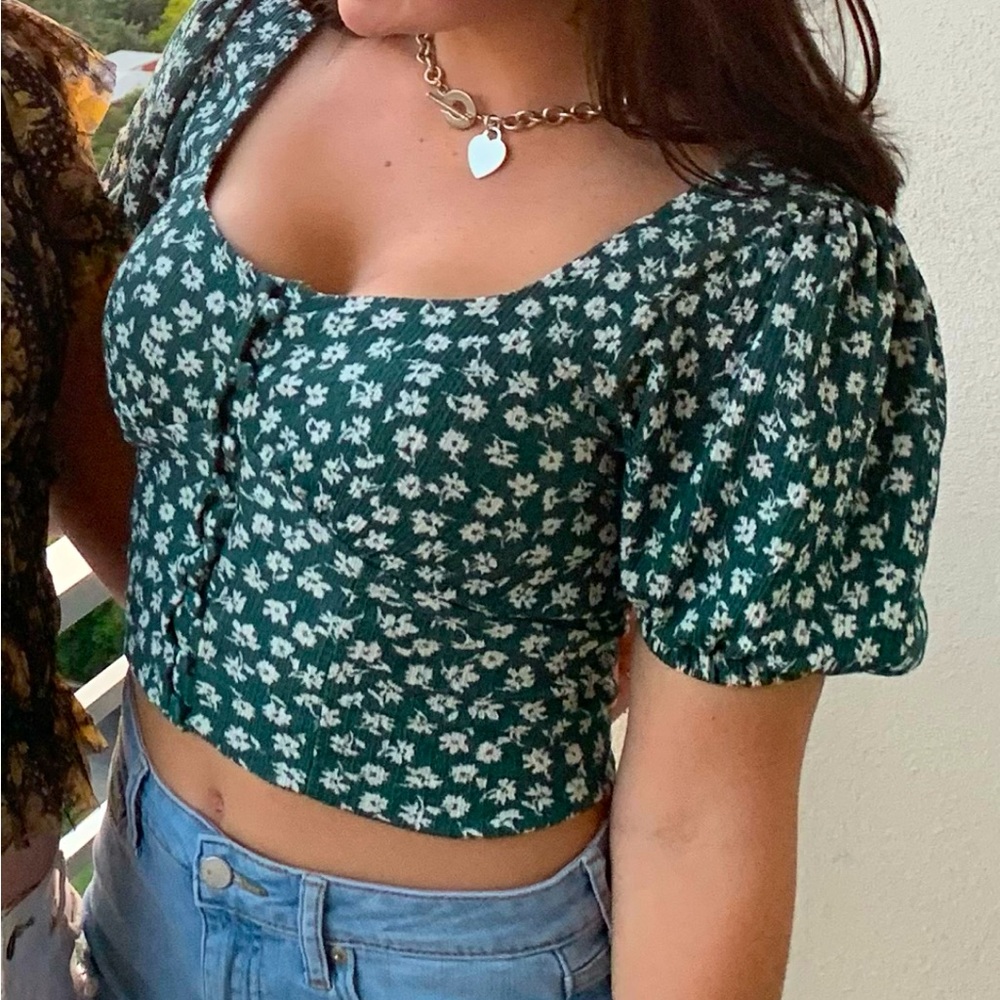 Small Free People cropped floral blouse.